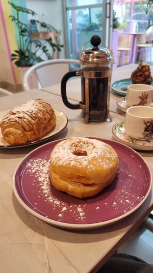 chocolate croissant & filled donut with whipped cream and jam at Frambuesa Pastelería Vegan in Bogota