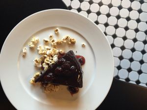 rich and dense chocolate cake with cherry sauce and caramels corn!  at Liberty Food & Wine Exchange in Reno