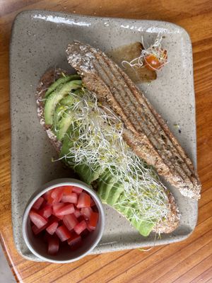 Avocado sandwich with extra portion of tomatoes  at La Bodega Verde in Lima
