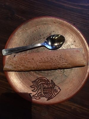 Sweet rice pancake that’s labelled vegan. It is extremely good and very filling. at Jatra Biroti in Dhaka