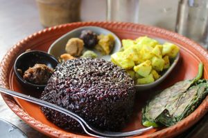 sticky rice platter at Jatra Biroti in Dhaka