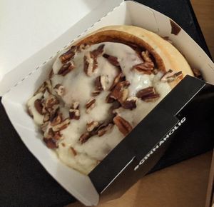 Customized cinnamon roll kept simple: Chai (frosting) and Pecans (topping) at Cinnaholic - Grand Canyon Dr in Las Vegas