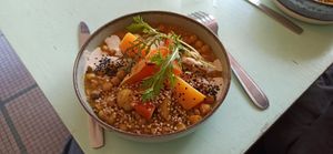 Plate of the day, chickpeas with roasted squash, sesam seeds and a delicious horseradish sauce. at Petite Nature in Rennes