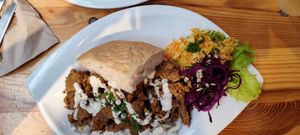 Seitan in bread with lots of salad. Tasty! at Cuit Lu Cru in Colmar