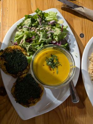 Combo menu of salad, soup, and vegetable rosti (in the shadow). at Cuit Lu Cru in Colmar