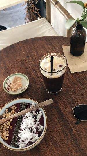 Iced Vietnamese Black Coffee, Açai Bowl and free sugar cookies at Rosie's Cafe in Hoi An