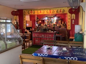 Shrine at the rear of restaurant  at Vegetarian House  in Phuket