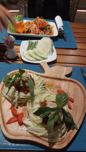 Raw zucchini pasta and som tam at Supernatural Restaurant at Friendship Beach in Phuket