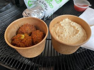 Side of falafel and hummus  at What The Pitta in London