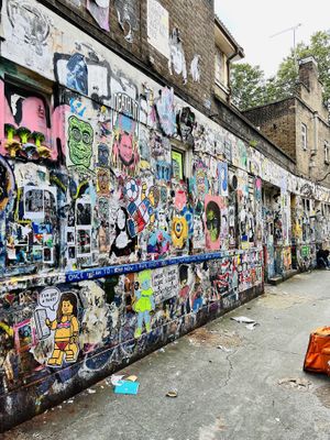 On the corner of this alley and Brick Lane   at What The Pitta in London