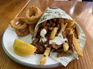 Onion rings and doner gyros yum!   at What The Pitta in London