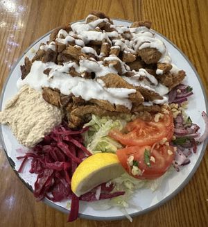 Doner and bulgur plate with tasty garlic sauce.   at What The Pitta in London