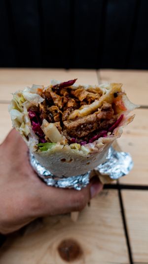 Vegan Döner 
Freshly Made Bread, Spiced Soya Pieces, Mixed Salad, Tzatziki (Soya yogurt), Homemade Hummus and Chilli Sauce.  at What The Pitta in London