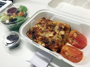 Veggie lasagna, roasted tomatoes, side salad with blackberry dressing and mini brownie at YoHoy in Escazu