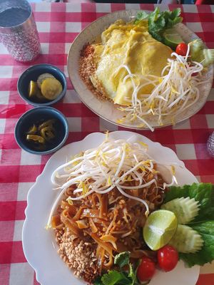 Vegan pad thai on bottom with egg/shrimp pad thai on top. at Yum Yum Thai in Daejeon