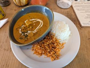 Chickpea and squash tikka masala with rice and carrot and toasted coconut salad 🤤 at The Pod in Coventry