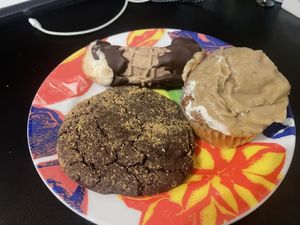 Elvis cupcake, a spiced marshmallow filled cannoli, and a s’mores cookie  at Jennifer Lee's Gourmet Bakery in Boston