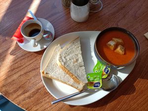 Soup served with bread and vegan butter. at Wal Restauraunt in Caernarfon