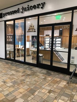 Located on the outside of the mall in the parking garage by Bloomingdales  at Pressed Juicery in Honolulu