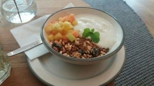 granola, fresh fruits, soy yoghurt at Malu in Dusseldorf