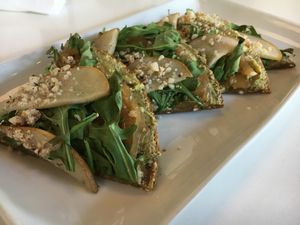 Arugula pear caramelized onion pizza at Living Kitchen in Raleigh