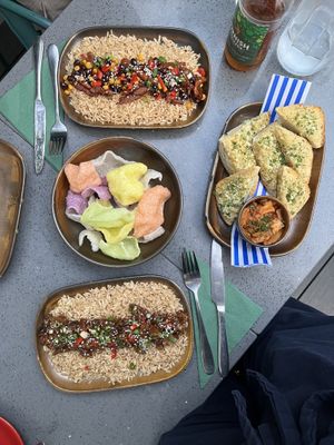 Firecracker pork (top), mushroom fusion, prawn crackers, garlic bread and kimchi.  at The Cornish Vegan in Truro