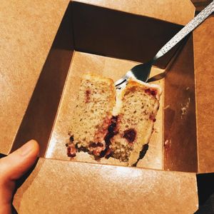 The beautiful lemon and raspberry cake in the takeaway box. at The Cornish Vegan in Truro