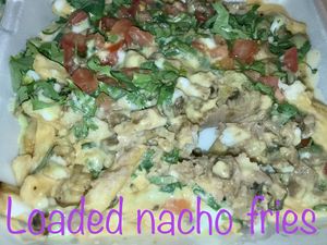 Loaded nachos with fries at El Palote Panaderia in Dallas