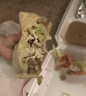 Gordita, came with two wrapped in foil. Not spicy great flavor and sizing for a child. We liked that it was two wrapped separately instead of one big messy one.  at El Palote Panaderia in Dallas