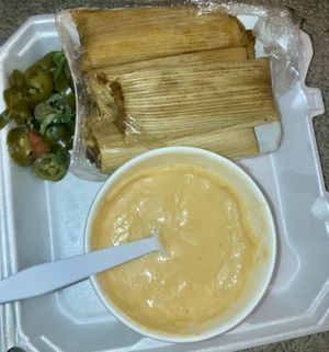 Tamales, (jalapeños from nachos), and big yummy cheese  at El Palote Panaderia in Dallas