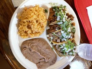 Taco plate half fajita/carne guisada  at El Palote Panaderia in Dallas