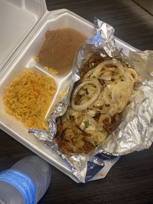 Birria tacos under there  at El Palote Panaderia in Dallas