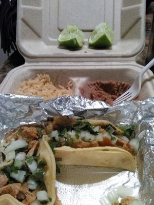 carnitas tacos with rice and beans at El Palote Panaderia in Dallas