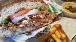 Torta Barbacoa with side of fries & queso at El Palote Panaderia in Dallas