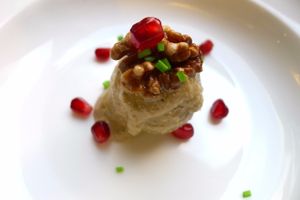 Cereal spheres with almonds sauce, walnut and pomegranate at Quinoa3 in Fuengirola
