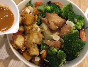 Japanese sesame power bowl: millet, monkey head mushroom, broccoli, cherry tomatoes and sliced almonds on a bed of lettuce. Sesame sauce by the side. Came with a free bowl of corn soup too.  at Yuan Xiang Veggie Kitchen 圆香蔬巧 in Central Singapore