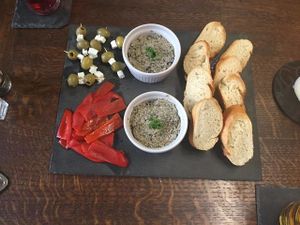 An Antipasti Starter Platter on our weekly changing Set Weekend Menu : Olive Tapenade, Rustic Bread, Red Peppers, Olives, Feta Cheese at The Hidden Veggie Kitchen in Limoges