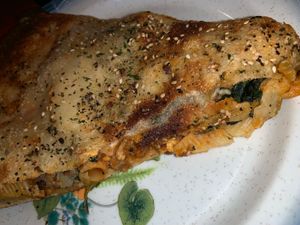 Stuffed slice! With rigatoni noodles, spinach, and vodka sauce  at That Pizza Place in Levittown