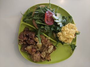 Southwest Sunrise - Breakfast sandwich with side of smashed potatoes at The Local in Prescott