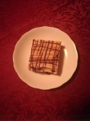 white chocolate/chocolate slice for $5, cakes/desserts change regularly  at Nagev in Evandale