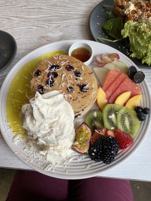 Buckwheat pancakes, lots of coconut ice cream, the pancakes were a little dry though. Lemon curd was delicious!  at Mr Black Juicery in Berwick
