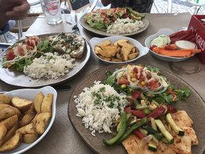 Portuguese style tofu with rice and salad.  at Ateliê 47 in Silves