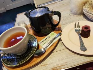 Earl grey (loose with soya milk and a truffle) at Paradise Plantbased in North West London