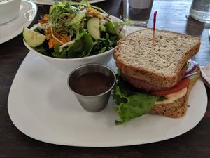Beyond burger on gluten free bread with salad at Grow Your Roots Cafe in Ottawa