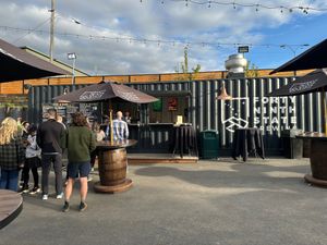 Main building is to the left in this photo.  at 49th State Brewing Co in Anchorage