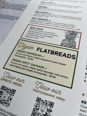 Menu clearly marks vegan options 🫶  at 49th State Brewing Co in Anchorage