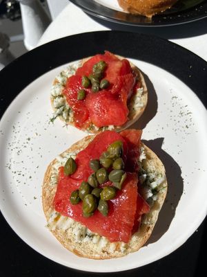Bagel with smoked "salmon” at De Aca in San Jose