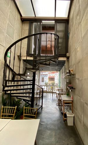 Spiral stair between 2&3 levels  at De Aca in San Jose