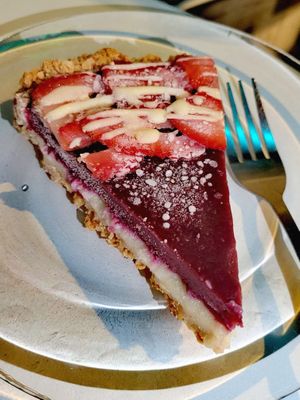 Red fruits and white chocolate dessert sweetened with agave. at De Aca in San Jose