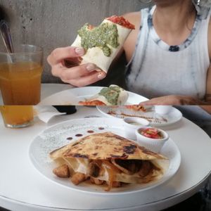 "Pizza" burrito and Quesadilla, both ok, pricey though. at De Aca in San Jose